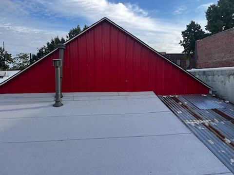 After: completed commercial low-slope re-roof, Jenks OK