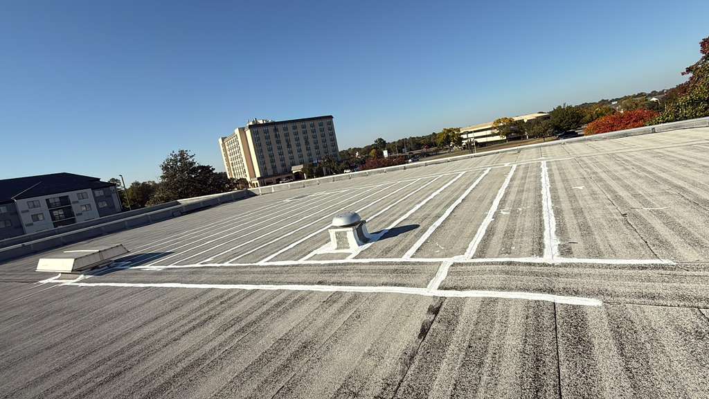 Flat roof seam seal repair, Tulsa commercial building