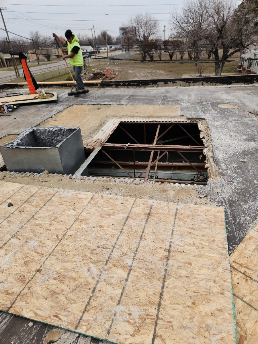 Major commercial roof deck repair, exposed structure