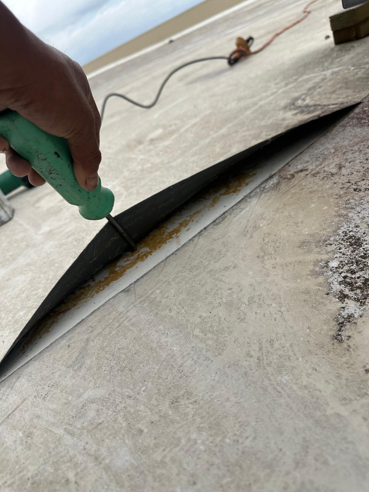 Sealing an EPDM seam on a flat commercial roof